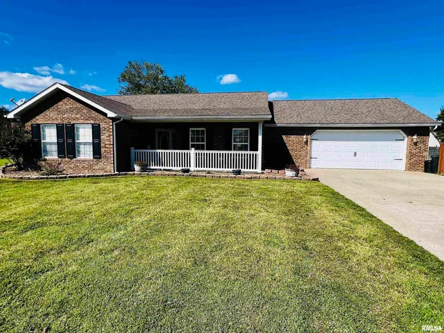 a view of a house with a big yard