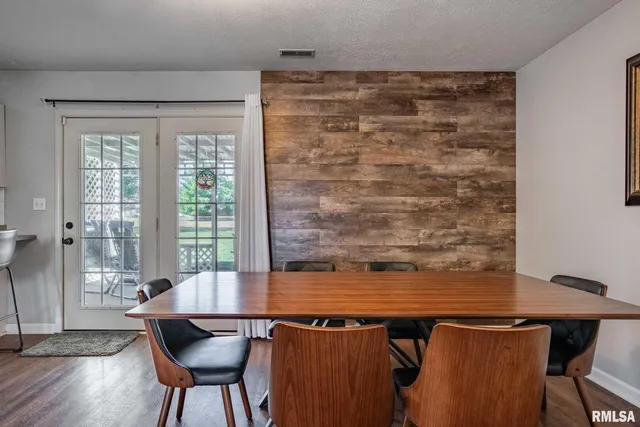 a room with chairs and a table