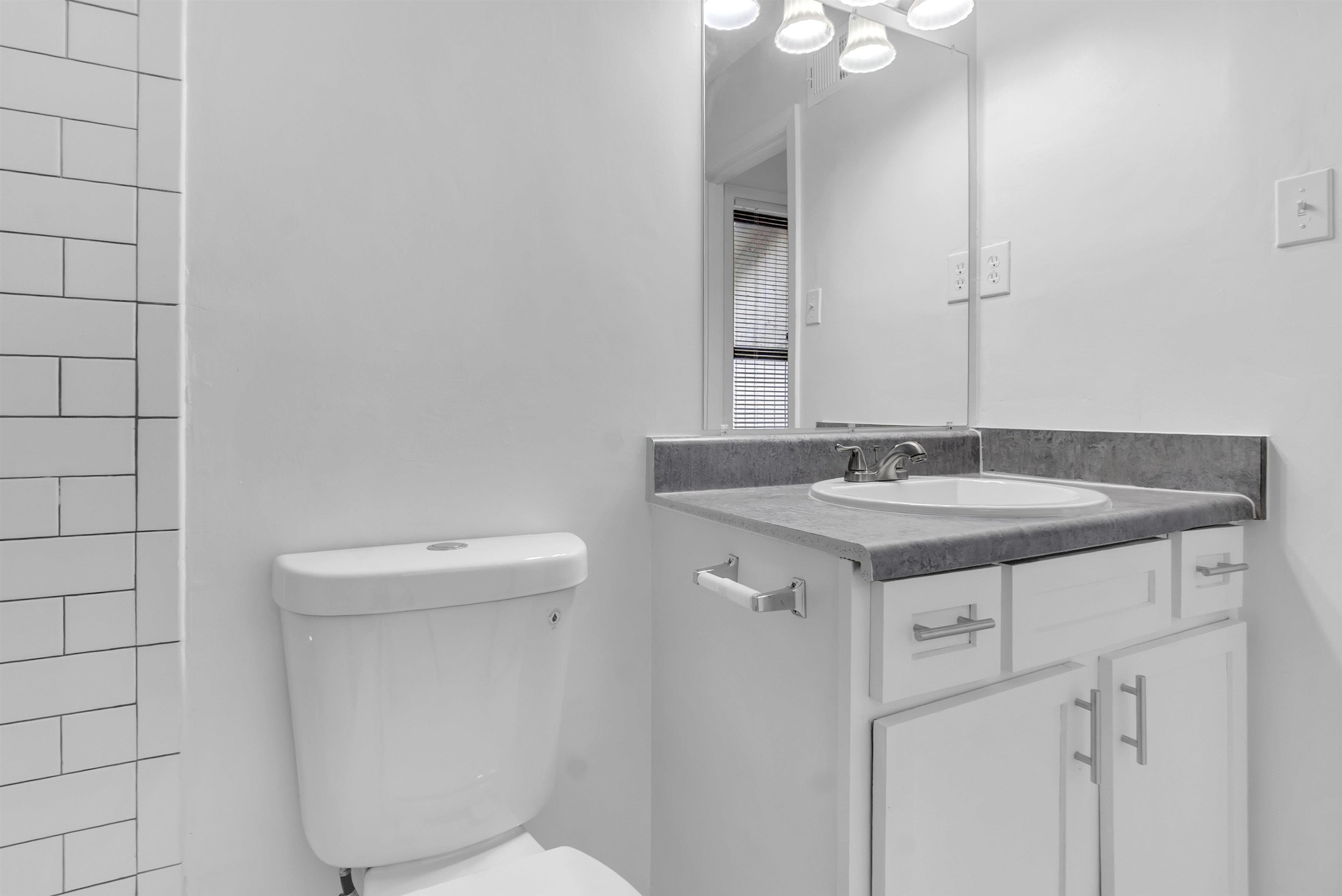 4579 Crump Road Memphis, TN 38141 - Photo 15 of 18 a sink and a toilet