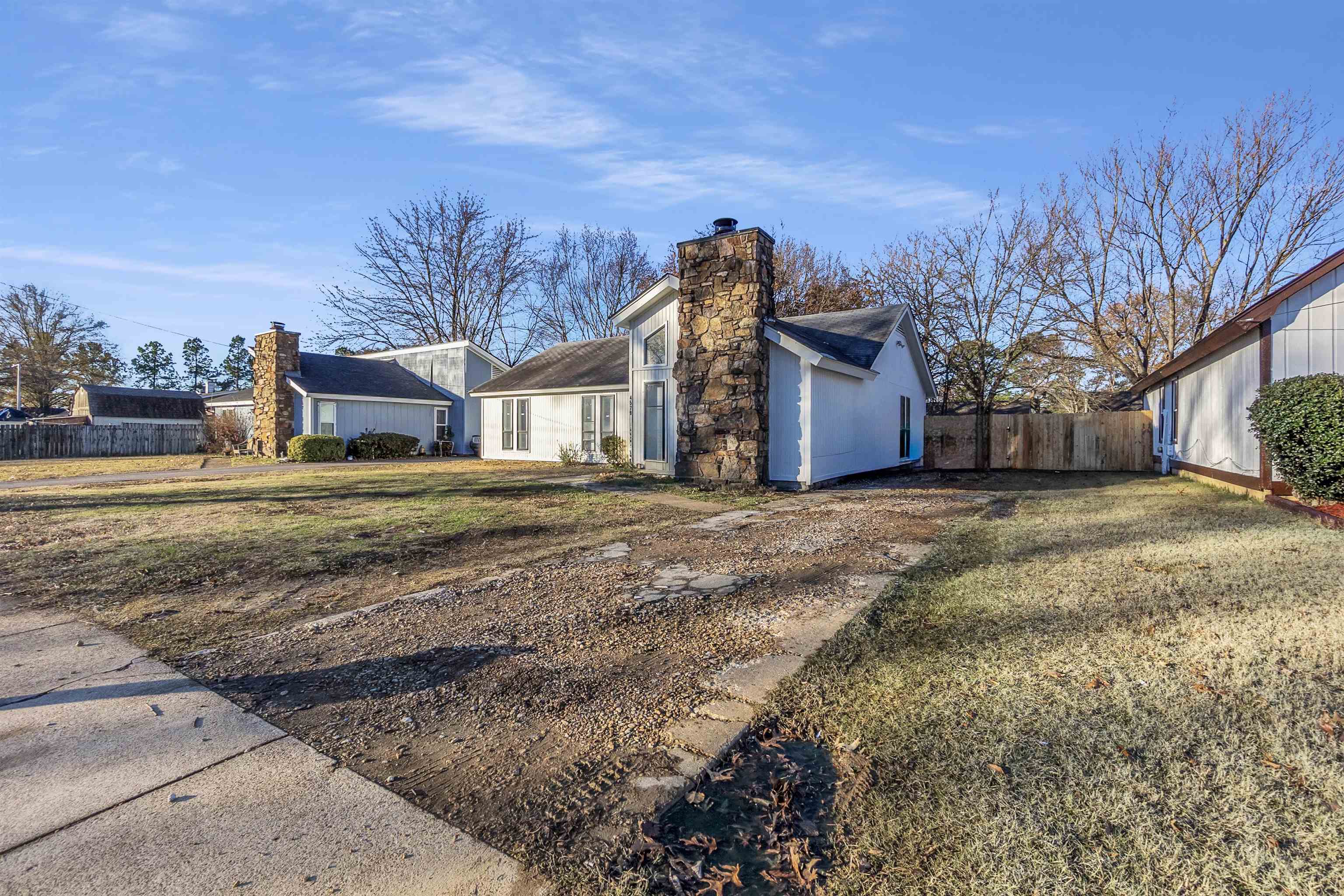 4579 Crump Road Memphis, TN 38141 - Photo 2 of 18 a view of a house with a yard