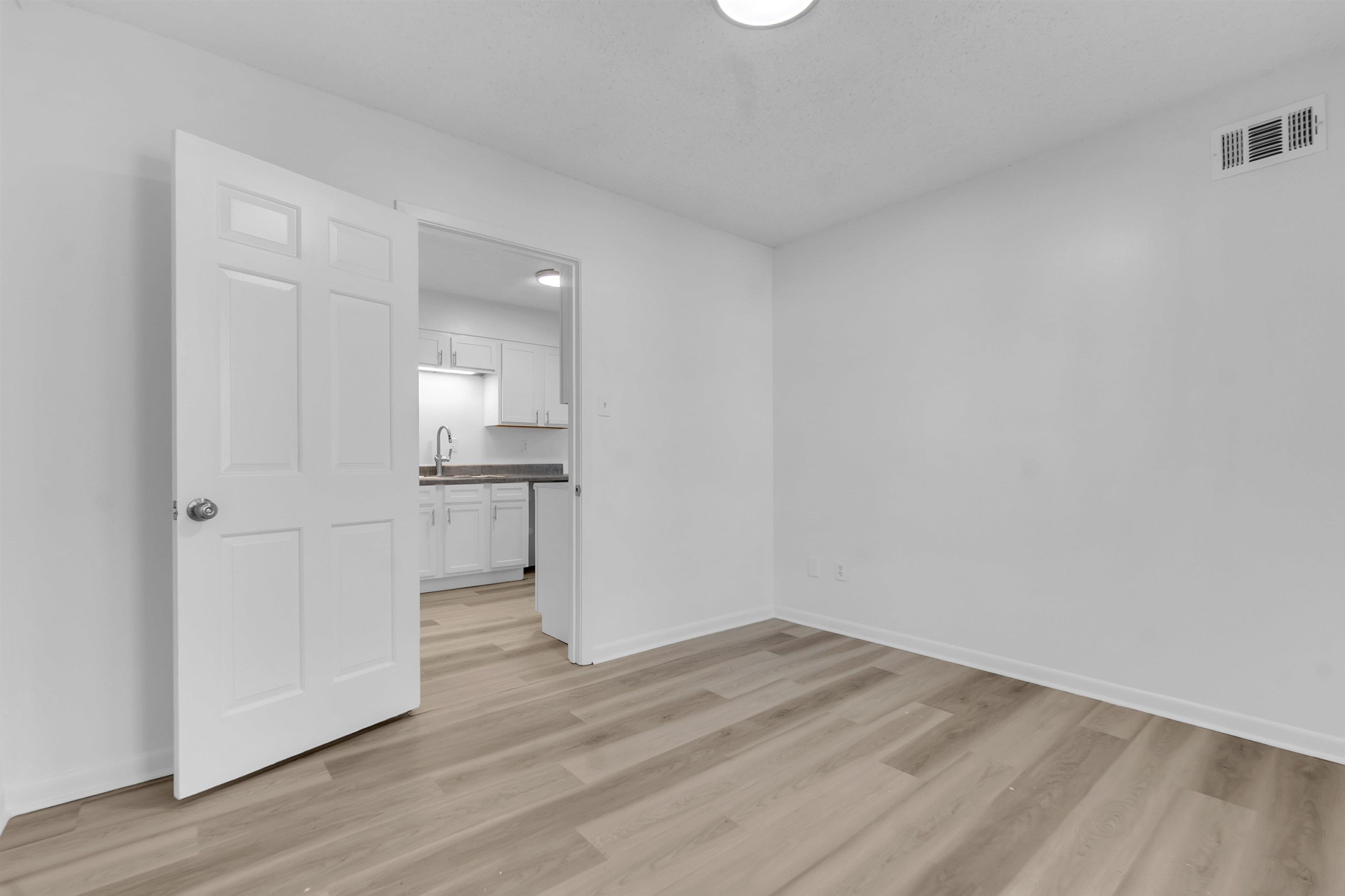 4579 Crump Road Memphis, TN 38141 - Photo 10 of 18 a view of kitchen with wooden floor