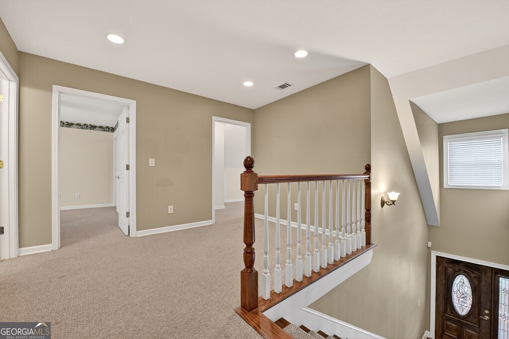 220 Oak Ridge Road Ellijay, GA 30536 - Photo 20 of 36 a view of a hallway with staircase