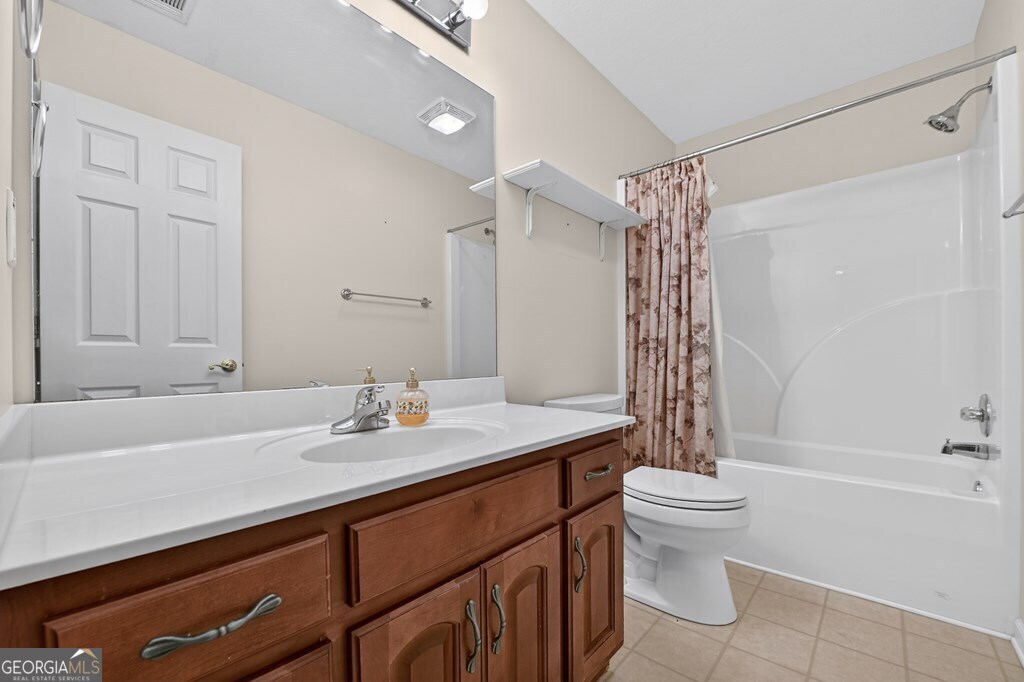 220 Oak Ridge Road Ellijay, GA 30536 - Photo 24 of 36 a bathroom with a sink a toilet and shower