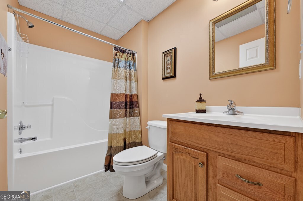 220 Oak Ridge Road Ellijay, GA 30536 - Photo 28 of 36 a bathroom with a sink a toilet and shower