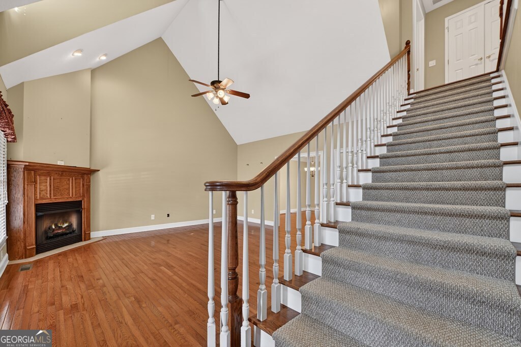 220 Oak Ridge Road Ellijay, GA 30536 - Photo 6 of 36 a view of an entryway with wooden floor and a fire place