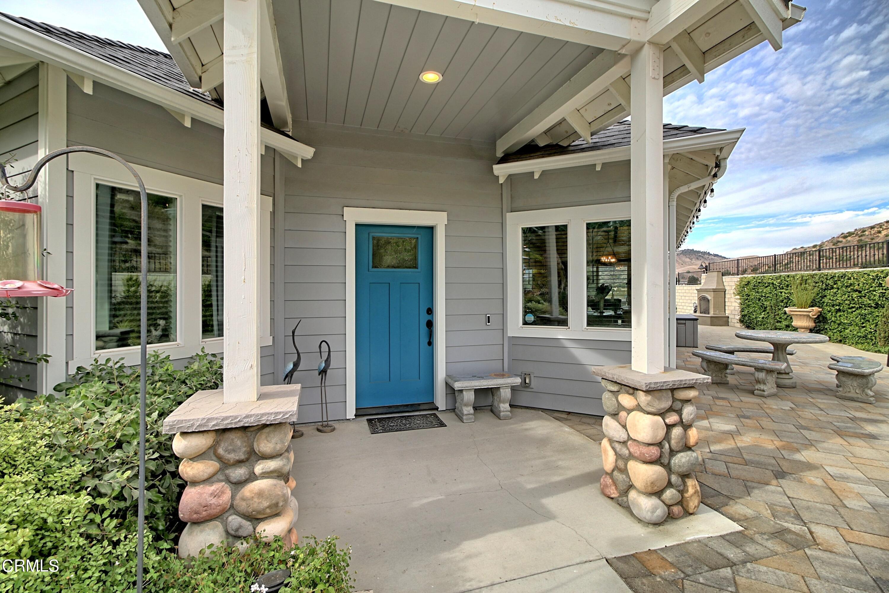 357 Los Cabos Lane Ventura, CA 93001 - Photo 2 of 44 a view of a patio with table and chairs and potted plants