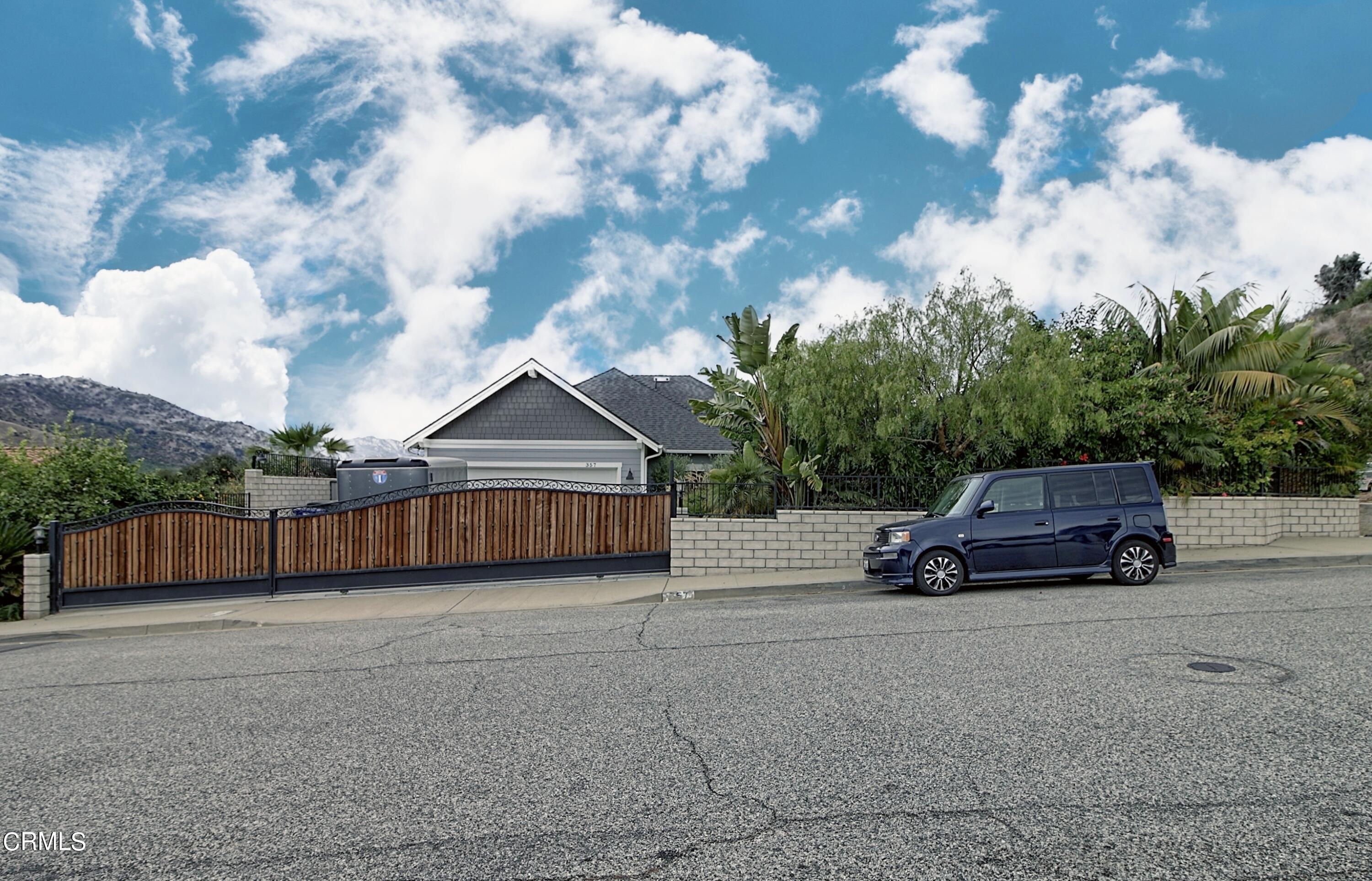 357 Los Cabos Lane Ventura, CA 93001 - Photo 32 of 44 a car parked in front of a house