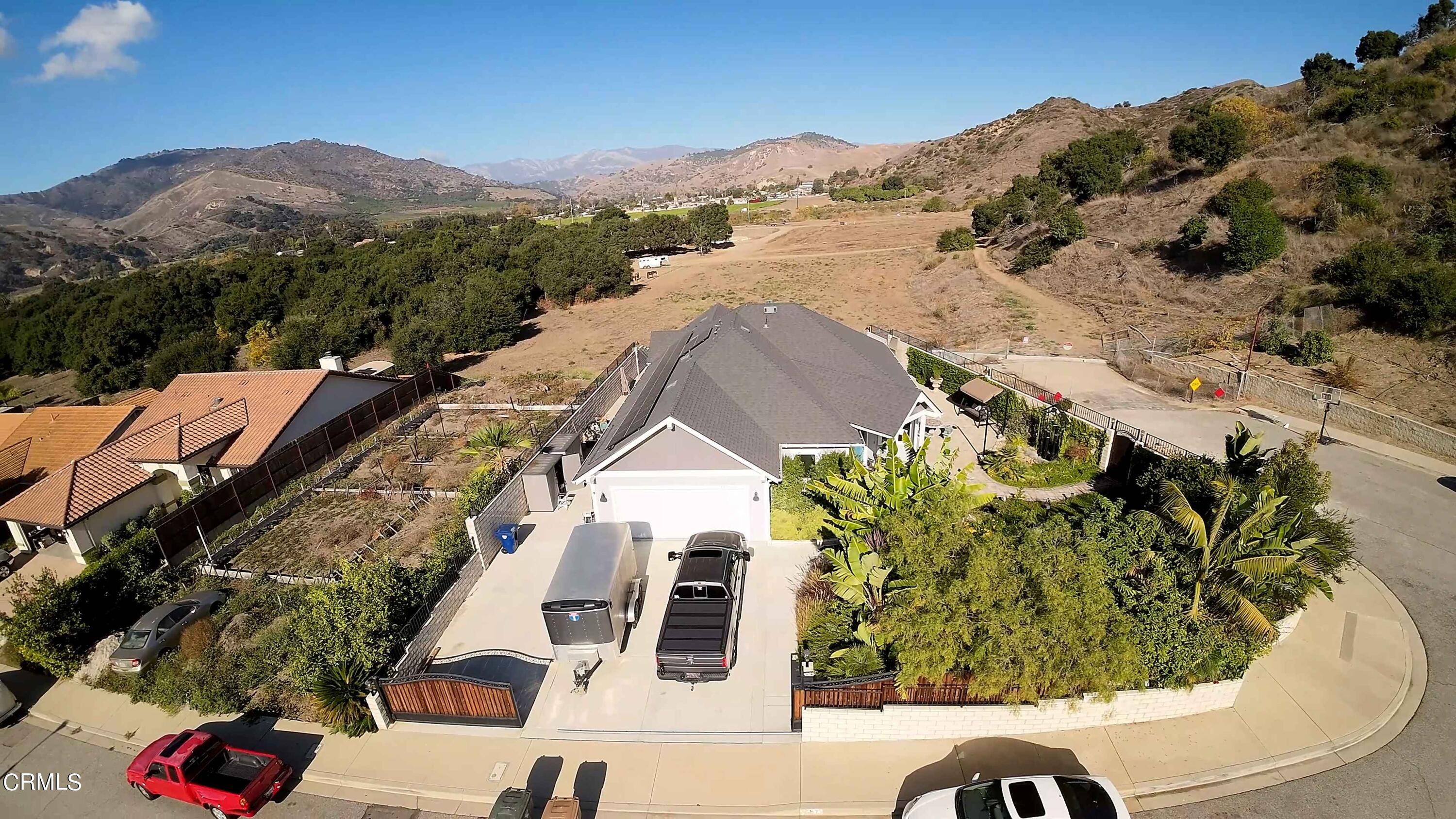 357 Los Cabos Lane Ventura, CA 93001 - Photo 36 of 44 a view of a terrace with a garden and mountain view