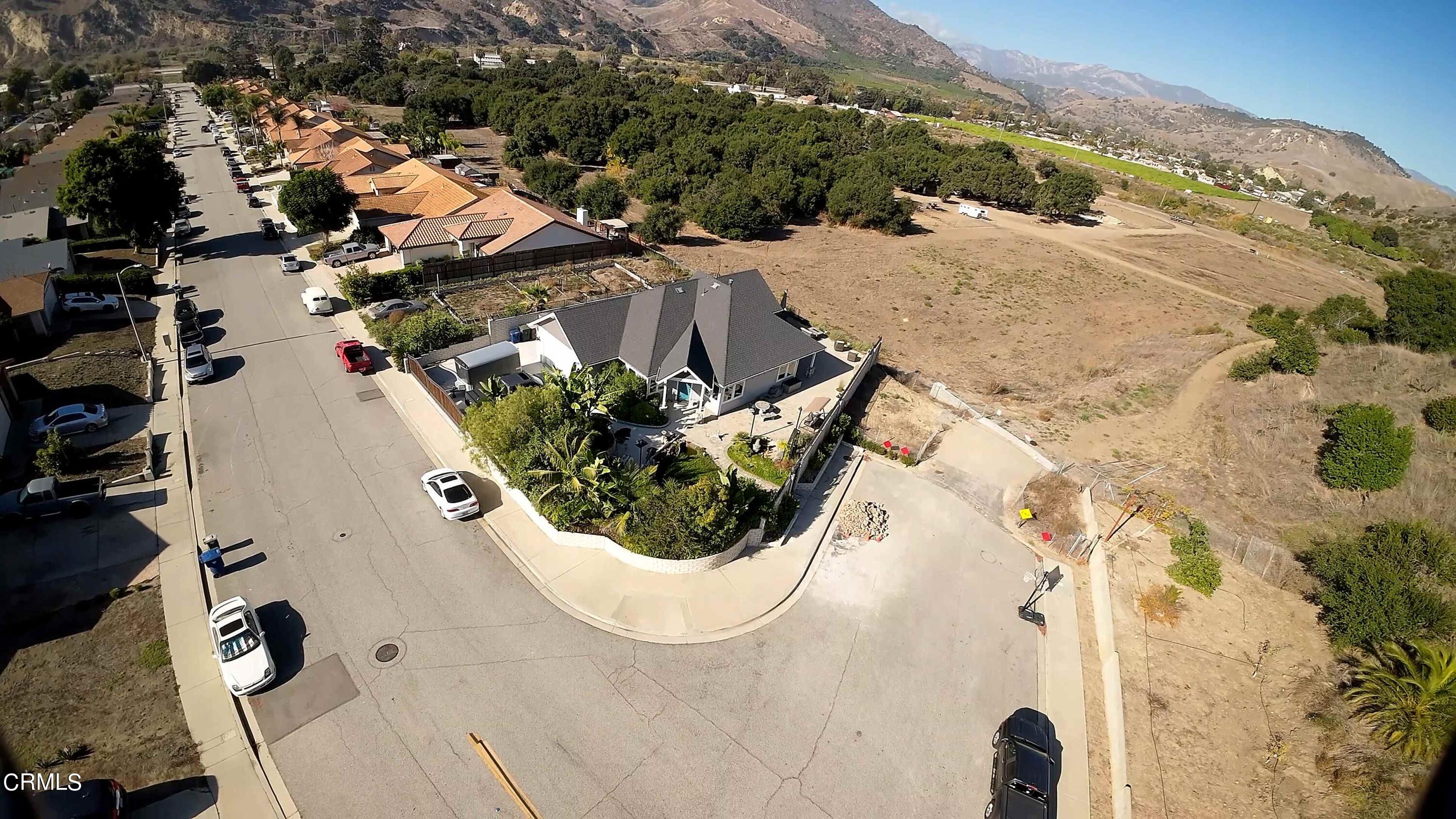 357 Los Cabos Lane Ventura, CA 93001 - Photo 37 of 44 an aerial view of a house with a yard