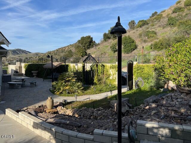 357 Los Cabos Lane Ventura, CA 93001 - Photo 5 of 44 a front view of a house with a yard