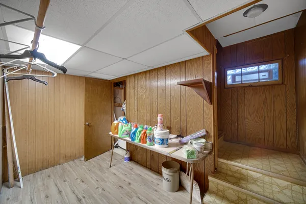 a bathroom with a toilet a sink and shower
