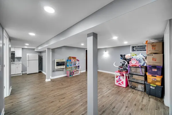 a kitchen with stainless steel appliances a refrigerator stove microwave and cabinets