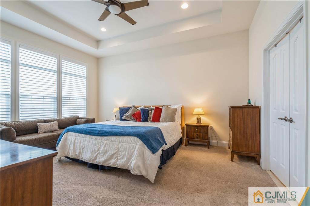 118 Cobblestone Boulevard Monroe Township, NJ 08831 - Photo 14 of 34 a bedroom with bed and window