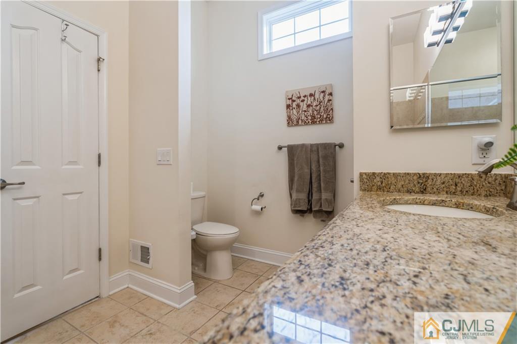 118 Cobblestone Boulevard Monroe Township, NJ 08831 - Photo 17 of 34 a bathroom with a toilet and a shower
