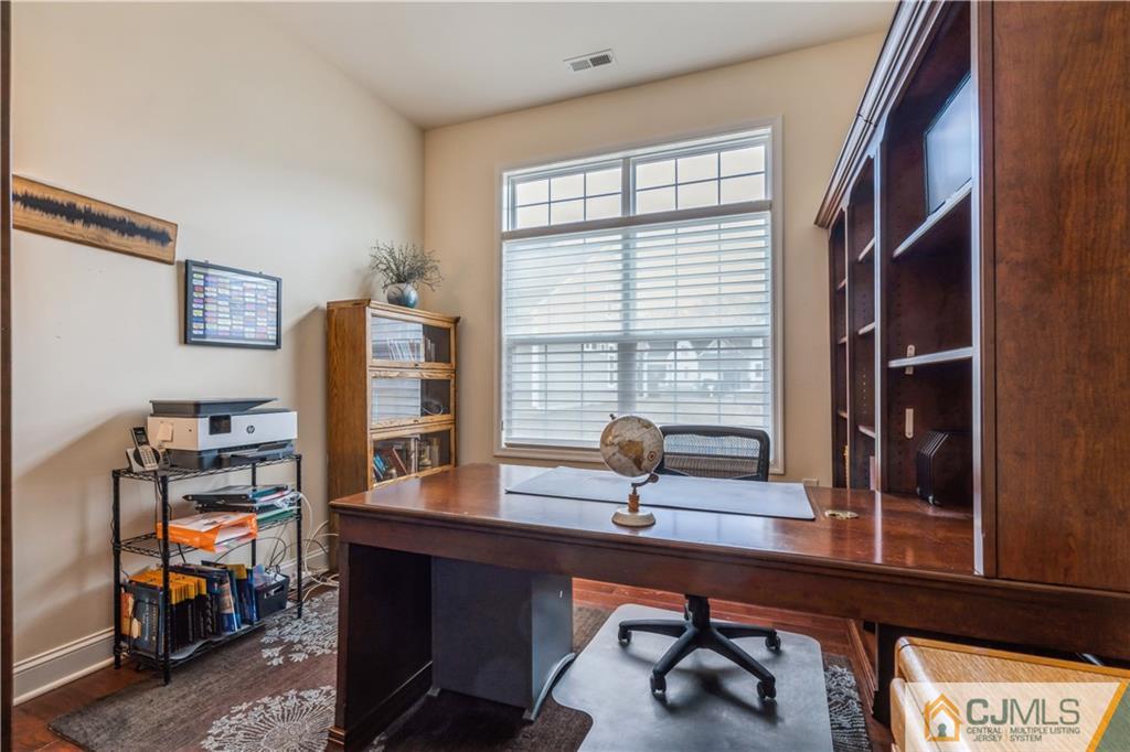 118 Cobblestone Boulevard Monroe Township, NJ 08831 - Photo 21 of 34 a view of a workspace with furniture and a window