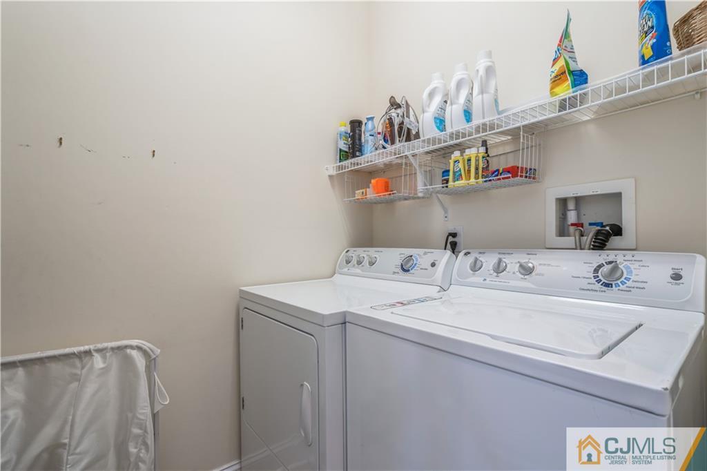 118 Cobblestone Boulevard Monroe Township, NJ 08831 - Photo 23 of 34 a utility room with dryer and washer