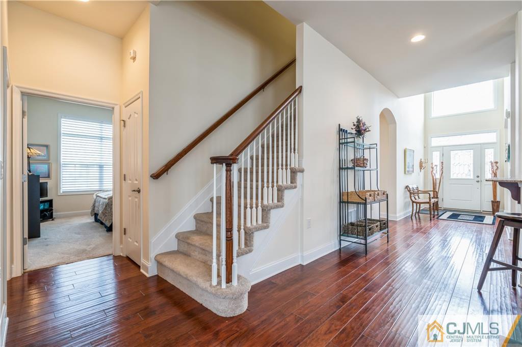 118 Cobblestone Boulevard Monroe Township, NJ 08831 - Photo 24 of 34 a view of a livingroom with furniture and hardwood floor
