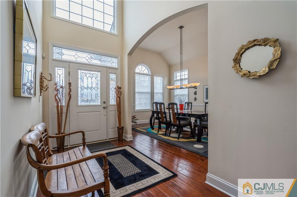 118 Cobblestone Boulevard Monroe Township, NJ 08831 - Photo 6 of 34 a view of an entryway with wooden floor