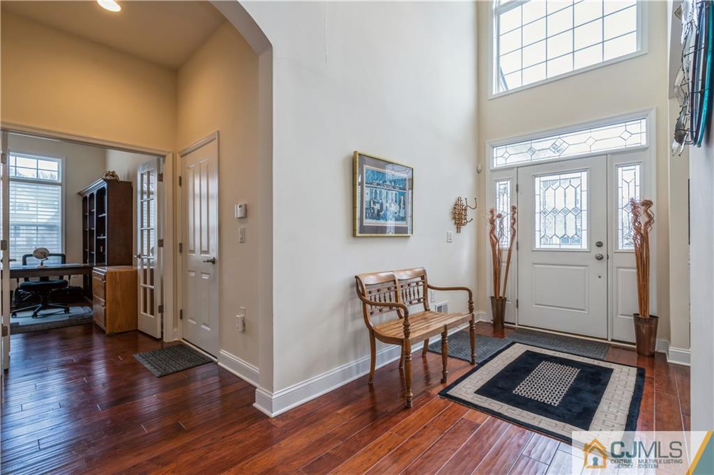 118 Cobblestone Boulevard Monroe Township, NJ 08831 - Photo 7 of 34 a view of a livingroom with furniture and hardwood floor