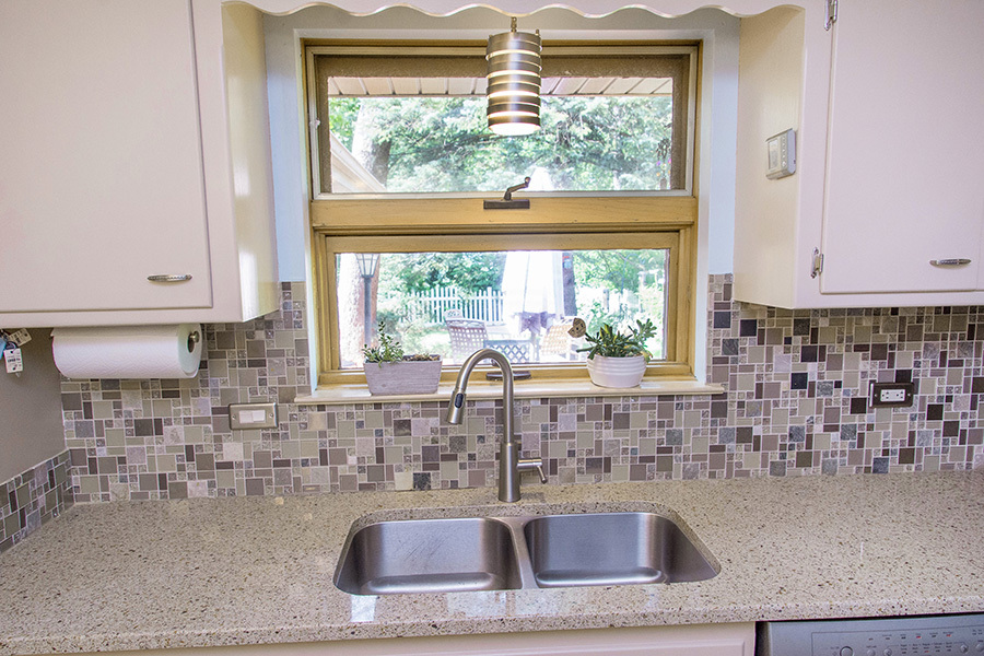 1208 Hillview Road Homewood, IL 60430 - Photo 11 of 32 a kitchen with granite countertop a sink and a window
