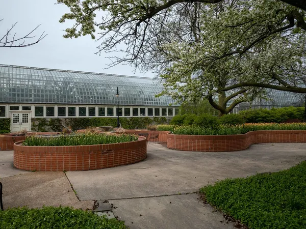 front view of a house with a garden