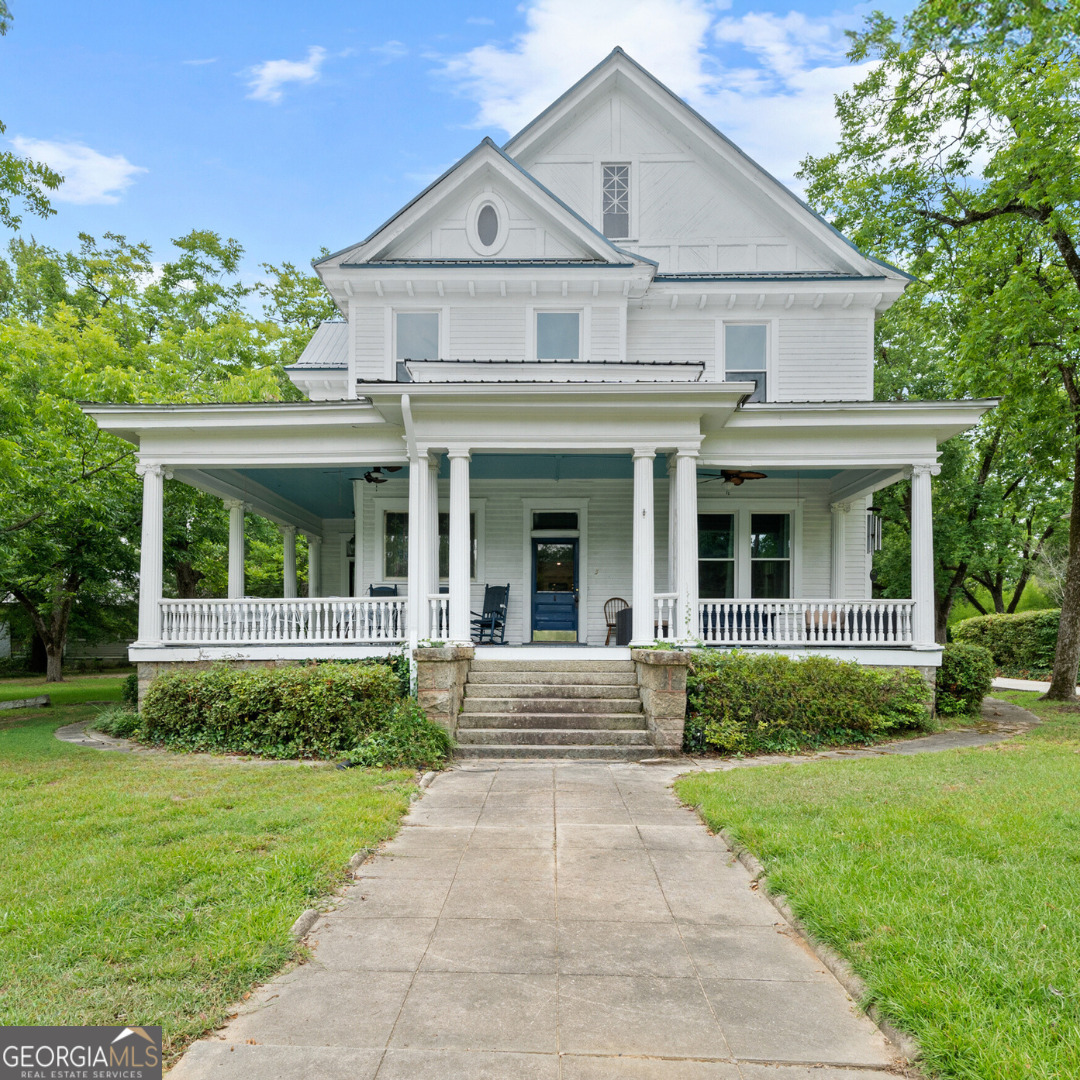 5 East Adams Street Sparta, GA 31087 - Photo 1 of 1 front view of a house and a yard