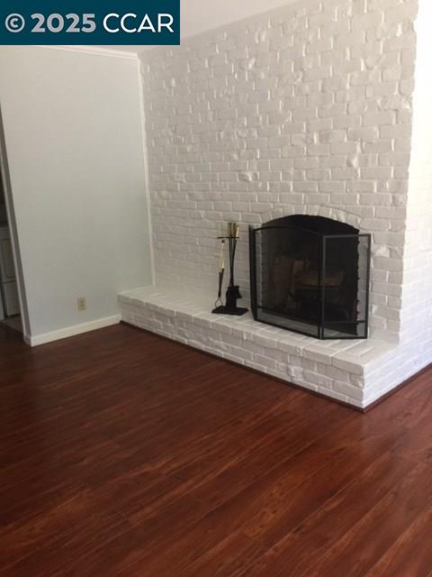 1000 Sanders Drive Moraga, CA 94556 - Photo 12 of 32 a view of wooden floor with a fireplace