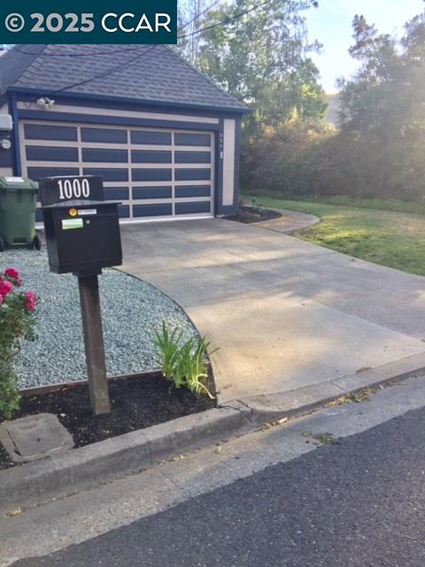 1000 Sanders Drive Moraga, CA 94556 - Photo 2 of 32 a front view of a house with a yard