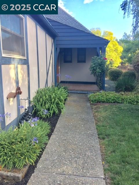 1000 Sanders Drive Moraga, CA 94556 - Photo 6 of 32 a front view of a house with a yard