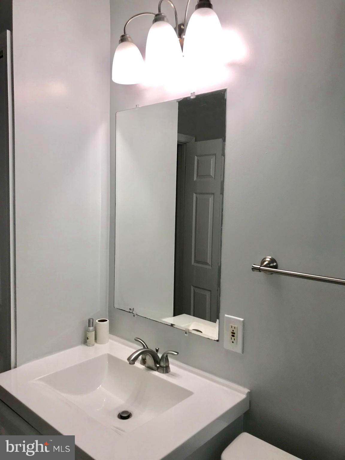 7607 Spruce Road Baltimore, MD 21222 - Photo 14 of 23 Main bath with new fixtures