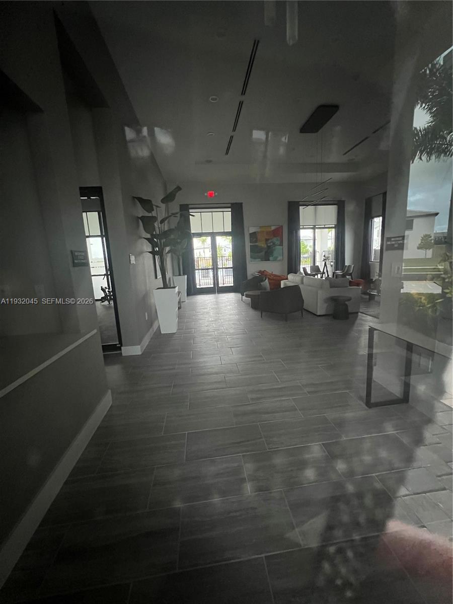 13387 Southwest 287th Terrace Homestead, FL 33033 - Photo 22 of 50 a view of a room with gym equipment