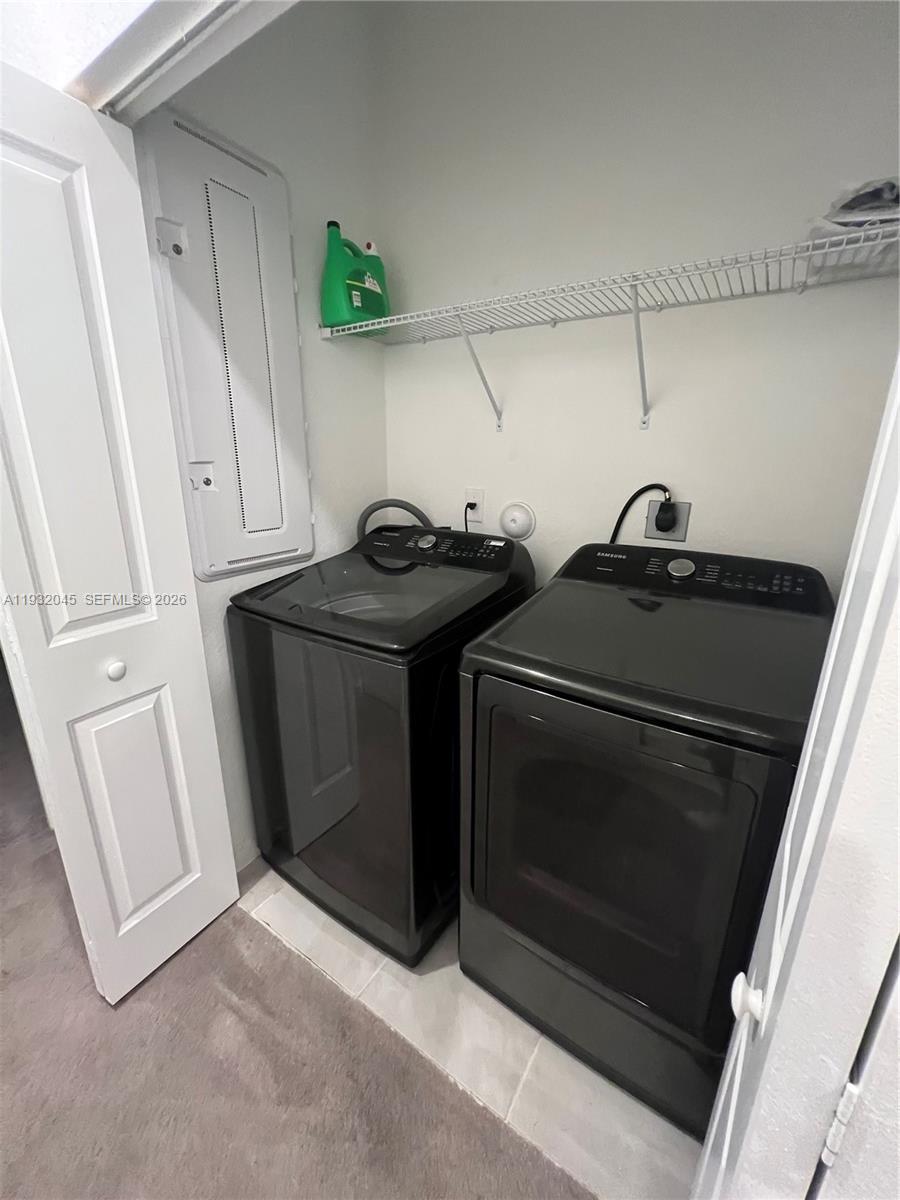 13387 Southwest 287th Terrace Homestead, FL 33033 - Photo 35 of 50 a utility room with dryer and washer