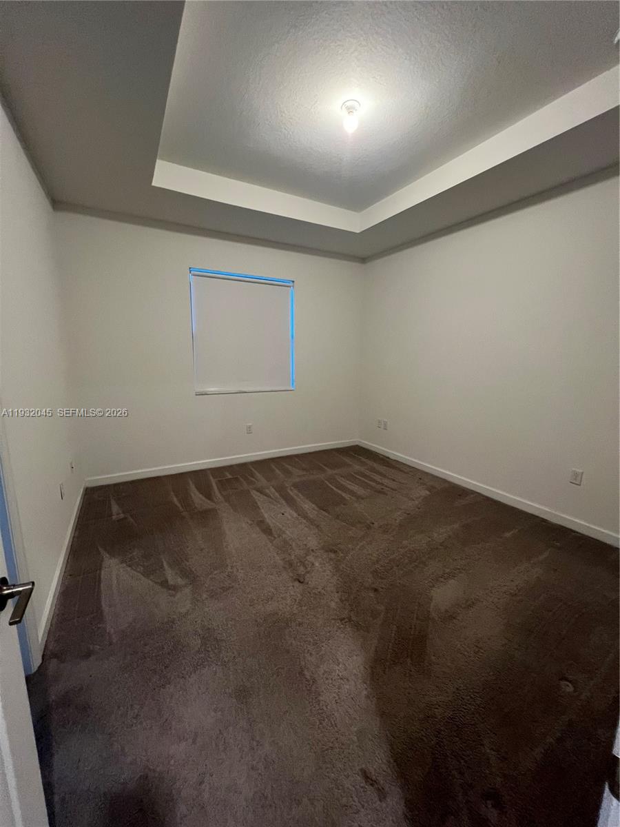 13387 Southwest 287th Terrace Homestead, FL 33033 - Photo 36 of 50 an empty room with a empty space and windows