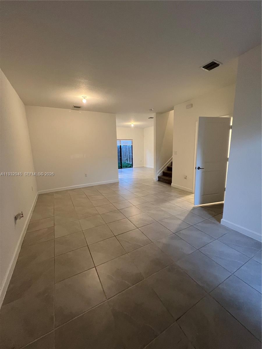 13387 Southwest 287th Terrace Homestead, FL 33033 - Photo 43 of 50 a view of a livingroom with a stove