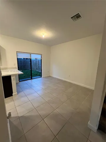 a view of a storage & utility room with a sink