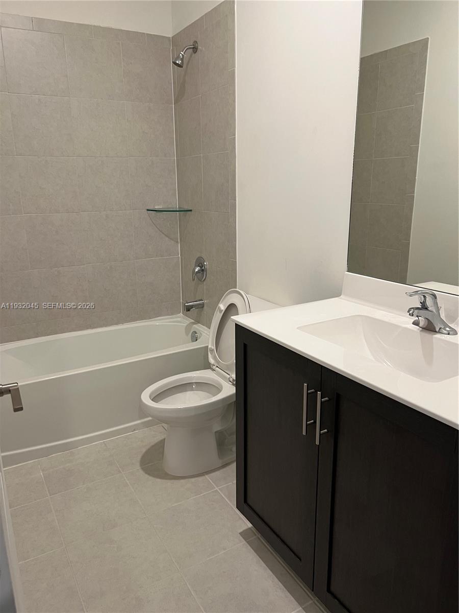 13387 Southwest 287th Terrace Homestead, FL 33033 - Photo 8 of 50 a bathroom with a sink a toilet and shower