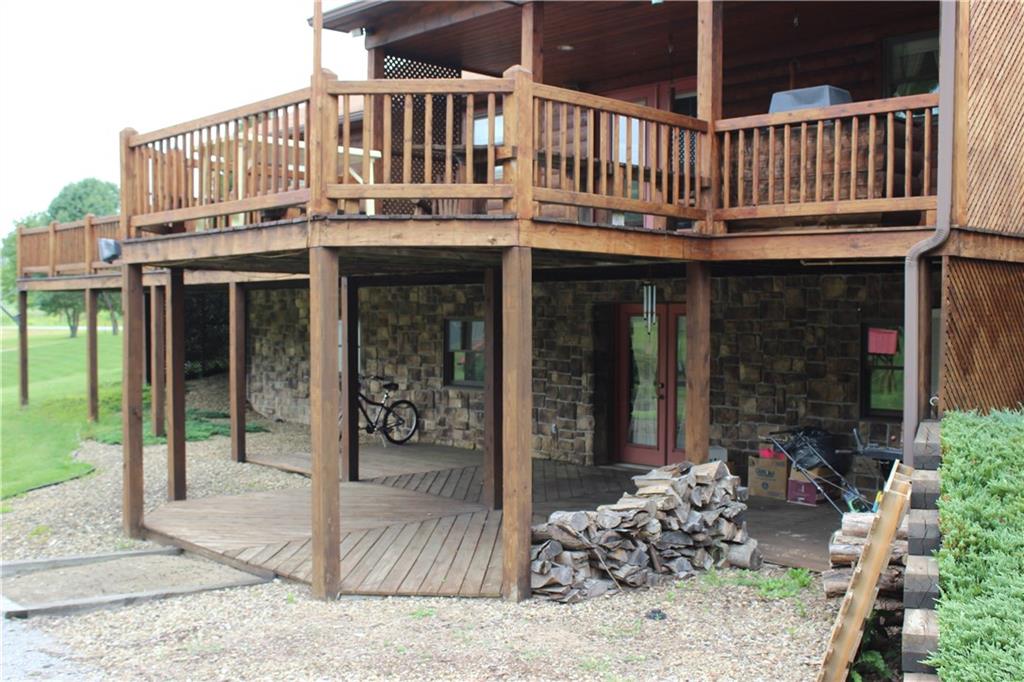 190 Leslie Road Valencia, PA 16059 - Photo 7 of 25 This view shows both the upper elevated deck and the lower covered patio areas. Both are easily accessed from the interior of the home & offer extended living enjoyment both in favorable or inclement weather.