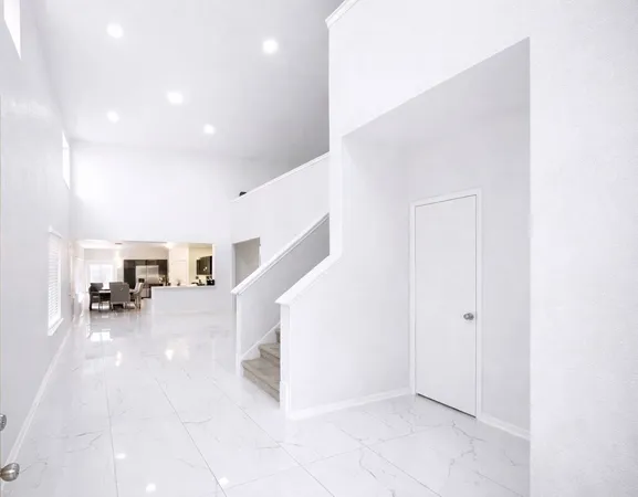 a view of a livingroom with a staircase