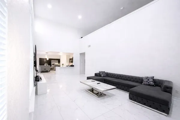 a living room with furniture and a couch