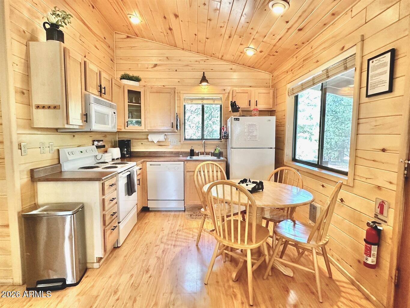2742 Fox Trail Overgaard, AZ 85933 - Photo 13 of 19 a kitchen with stainless steel appliances granite countertop a sink and cabinets