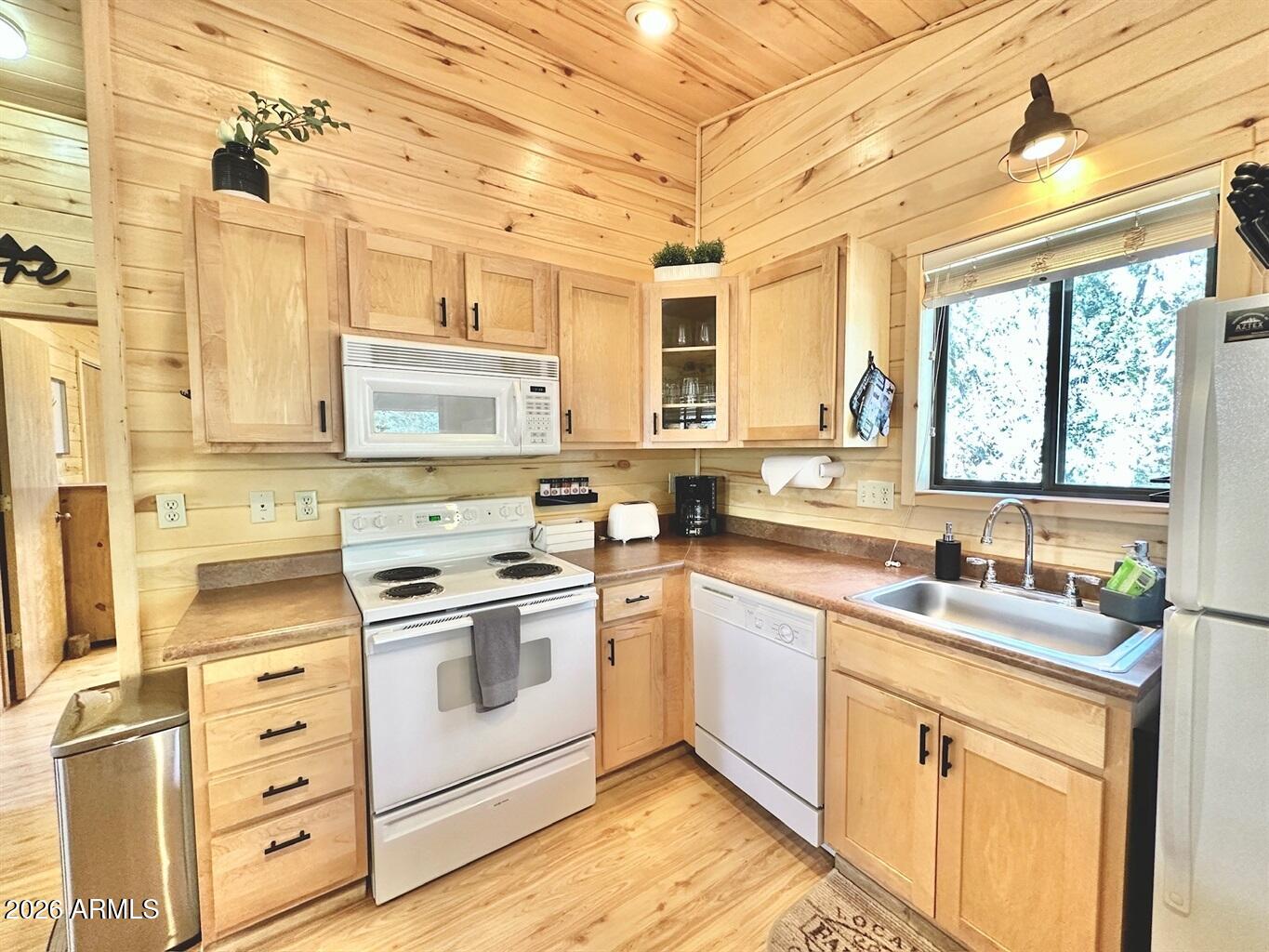 2742 Fox Trail Overgaard, AZ 85933 - Photo 14 of 19 a kitchen with stainless steel appliances granite countertop a sink a stove and cabinets