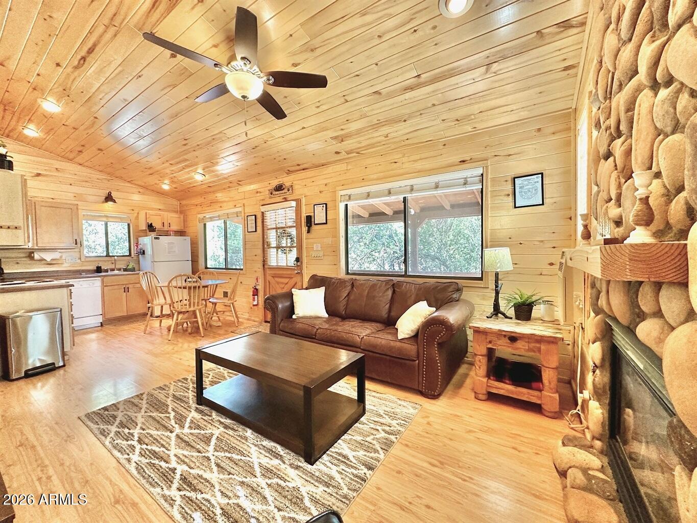 2742 Fox Trail Overgaard, AZ 85933 - Photo 5 of 19 a living room with furniture and a large window