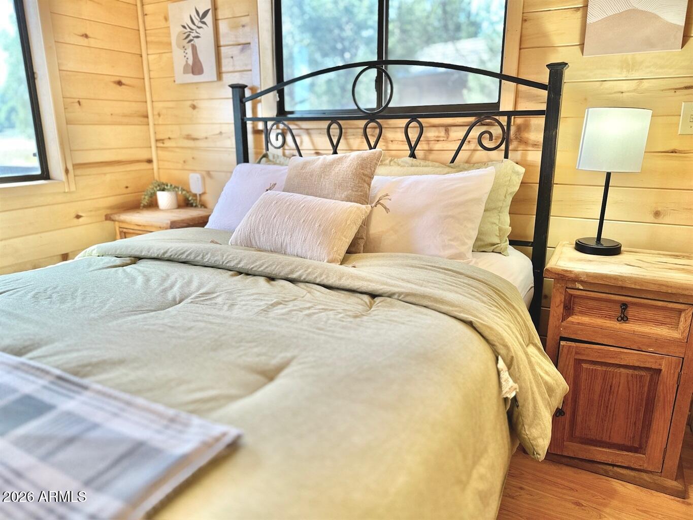 2742 Fox Trail Overgaard, AZ 85933 - Photo 8 of 19 a bedroom with a bed and a window