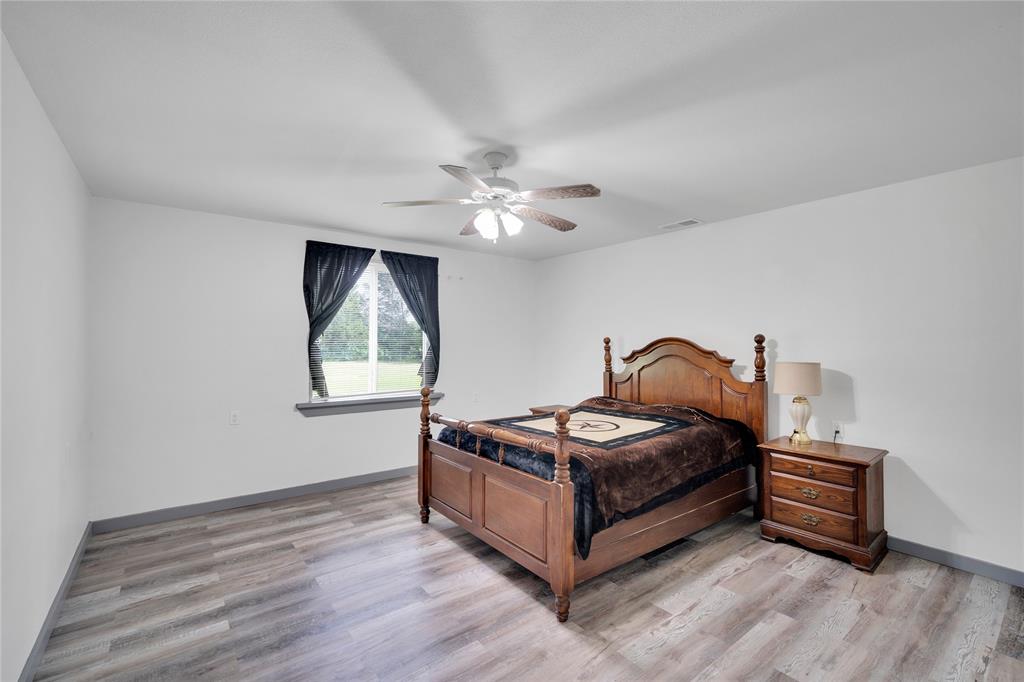 10476 County Road 313 Terrell, TX 75161 - Photo 16 of 40 a bedroom with a bed and a window