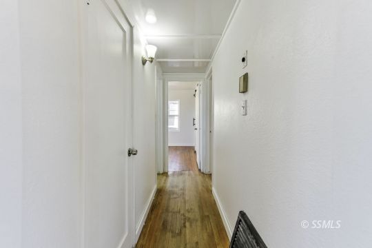 329 North Balsam Street Ridgecrest, CA 93555 - Photo 19 of 27 a view of a bathroom from a hallway
