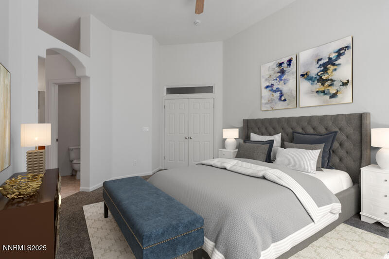 5540 Daybreak Drive Reno, NV 89523 - Photo 17 of 22 a bedroom with bed and painting on the wall