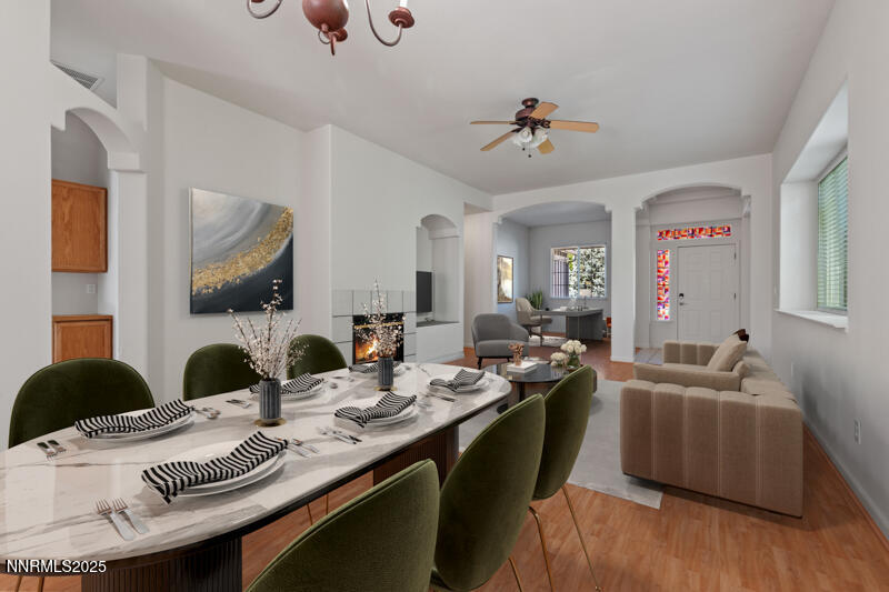 5540 Daybreak Drive Reno, NV 89523 - Photo 7 of 22 a living room with furniture and a chandelier