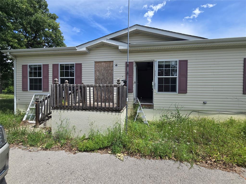 front view of house with a yard