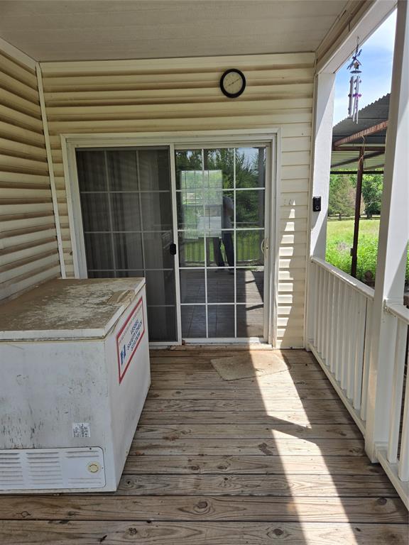 1331 Jay Bird Road Springtown, TX 76082 - Photo 11 of 18 a view of a house with a large window