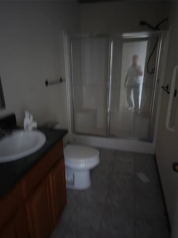 1331 Jay Bird Road Springtown, TX 76082 - Photo 14 of 18 a bathroom with a toilet and a sink